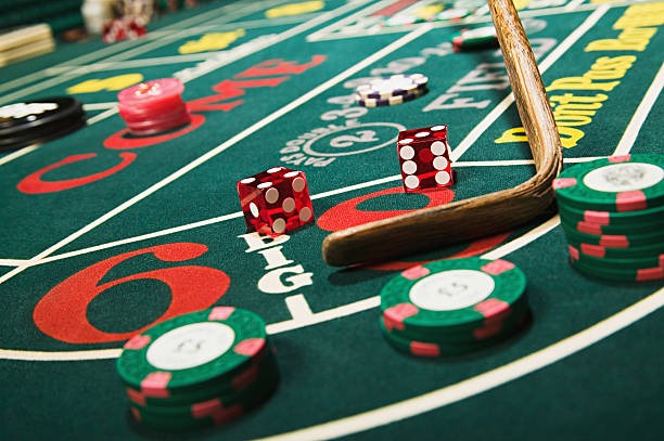 Blackjack table interface with betting zones and payout table